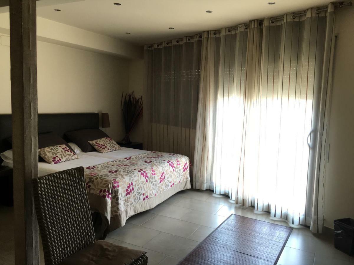 Hotel Calabria ลา การ์ริกา ภายนอก รูปภาพ